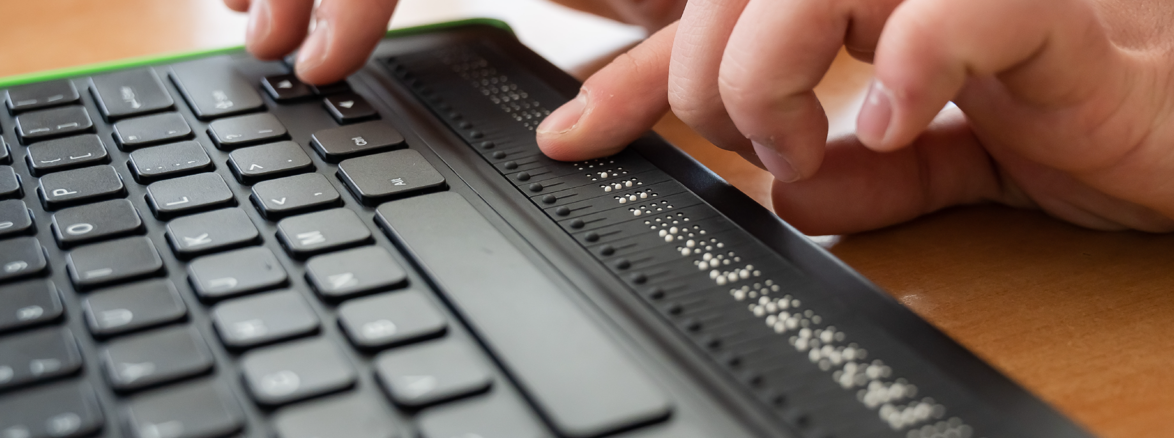 A person using a braille keyboard.