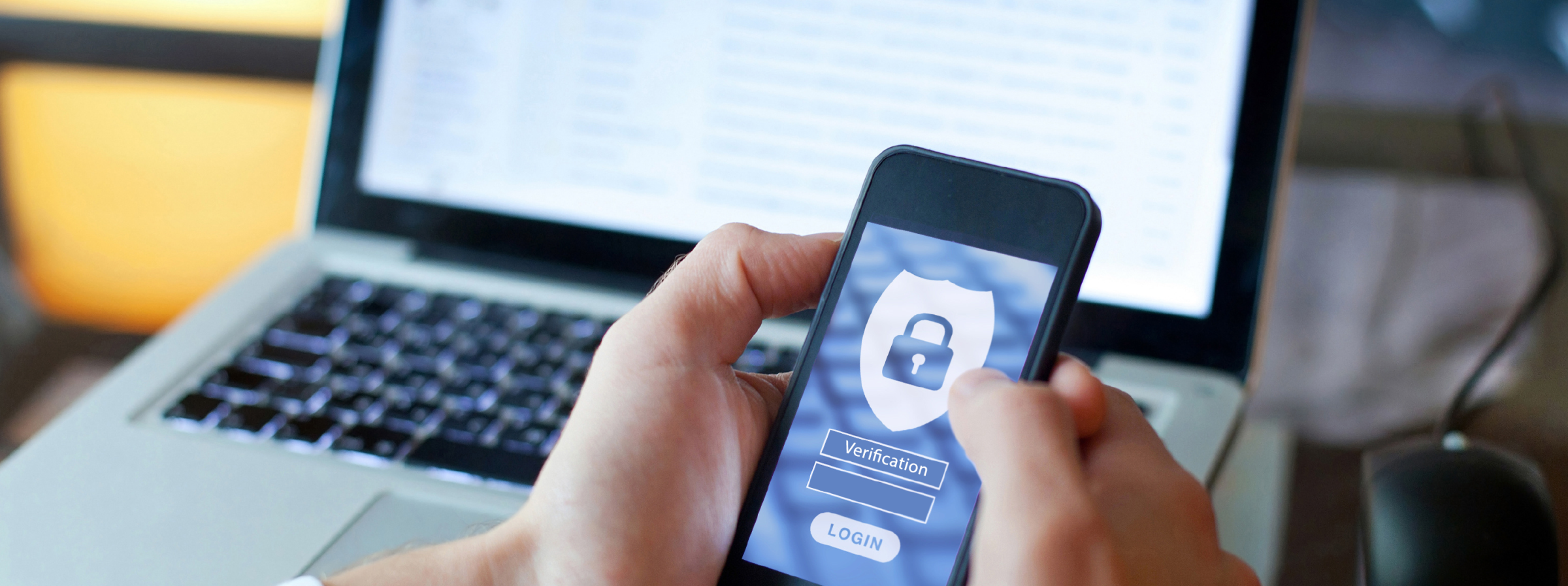 A person verifying login information on a cellphone.