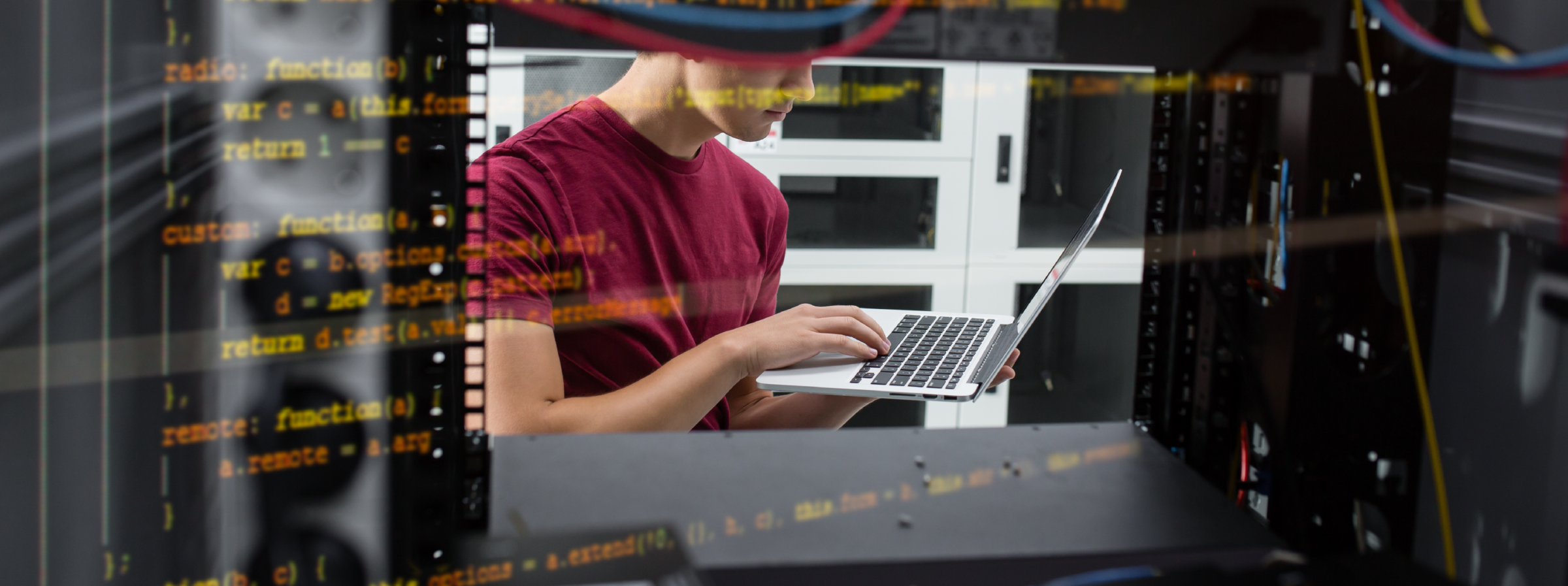 An IT worker in a server room 