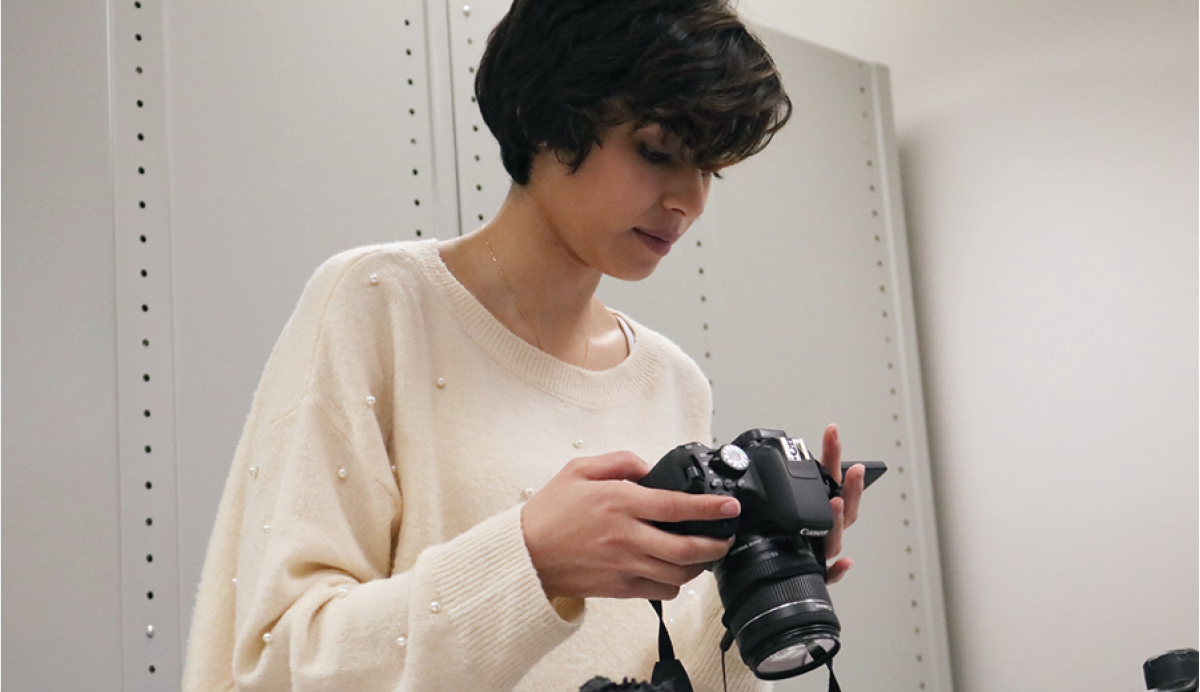 Student using a camera.